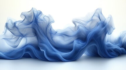 Fototapeta premium Abstract blue fabric waves flowing gracefully on white background.