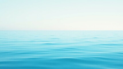 Fototapeta premium Serene Ocean Horizon A Tranquil View of Calm Water Under a Pale Sky