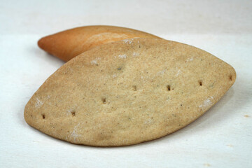 Traditional Oval Flatbread on Neutral Background