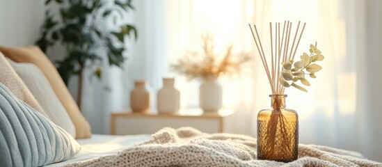 Elegant reed diffuser glass bottle in a serene bedroom, bathed in morning light, creating a calming aromatic ambiance for relaxation.