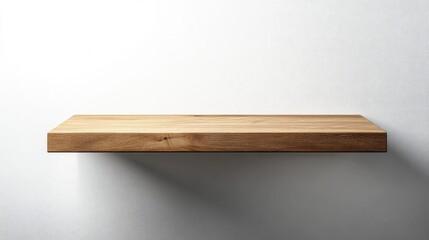 Minimalist Wooden Shelf Displaying Clean Design and Soft Shadows on White Wall