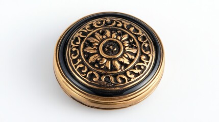 An isolated black and gold button, featuring intricate designs and a raised center, rests on a plain white background. The button's polished surface reflects the surrounding light