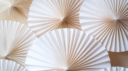 Elegant geometric white origami fans layered artfully creating a captivating textured backdrop perfect for creative design projects