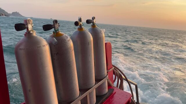 Scuba cylinders on the boat at dawn, Thailand