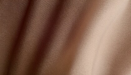 Fototapeta premium Close-up of Smooth Brown Fabric with Subtle Texture and Light Play