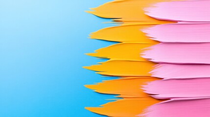 Colorful paint strokes on a blue background for creative design.