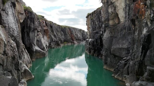 A stunning small canyon carved by the blue waters of the J&ouml;kuls&aacute; &aacute; Br&uacute; river in Iceland