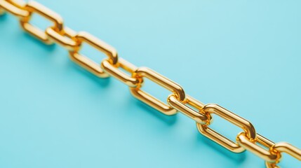 Obraz premium Golden Chain Link on Blue Background - Minimalism
