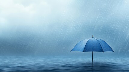 A blue umbrella floating in the middle of a body of water