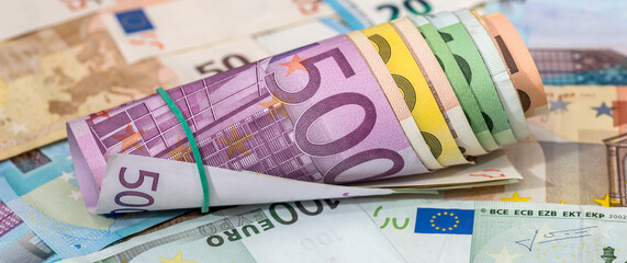 50 100, 200 and 500 euros bills currency banknotes as finance background. European paper money backdrop