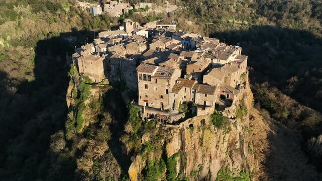 The medieval village of Calcata built on a tuff mountain. Lazio, Italy.
Aerial view of the tuff houses of the characteristic village of Calcata in the province of Viterbo near Rome.