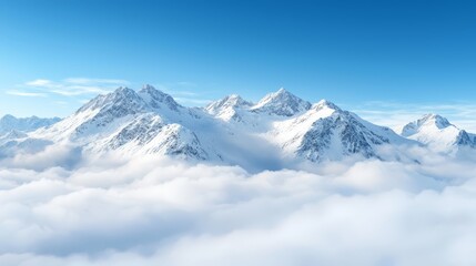 Obraz premium A view of a mountain range above the clouds