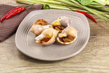 Snails baked with garlic and spices