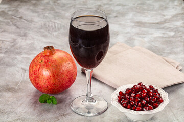 Sweet fresh pomegranate juice with fruit