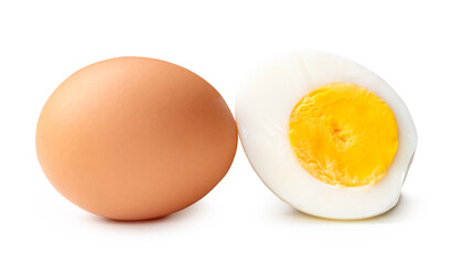 Side view of raw chicken egg and peeled cooked or boiled egg with egg yolk in half isolated on white background with clipping path