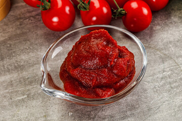 Red tomato paste in the bowl