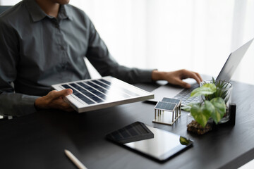 Solar panels green energy Business man working  green eco friendly office business creative idea...