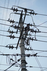 Power pole with transformer station