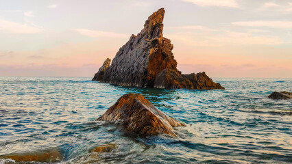 Rocky Shoreline at Galeazza Beach Imperia, Italy, at Sunset