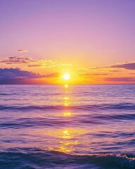 Fototapeta premium A serene sunset over calm ocean waters, creating a tranquil atmosphere.
