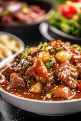 Delicious Chinese Beef Stir Fry in Savory Sauce with Fresh Vegetables and Aromatic Herbs Served in a White Bowl on a Dark Slate Background