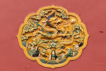 Dragon paintings adorn the walls of the Forbidden City in Beijing