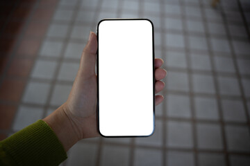 Smart phone mockup. Women hands holding cell telephone blank copy space screen smartphone blank white screen isolated technology concept.