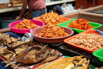 Dried fish on display at a food market stall in Oaxaca, Mexico.