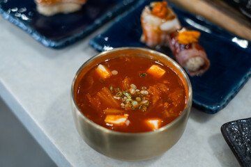 Kimchi soup vegetable tofu stew Korean food meal dinner spice dish
