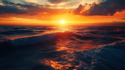 Fiery sunset over ocean waves.