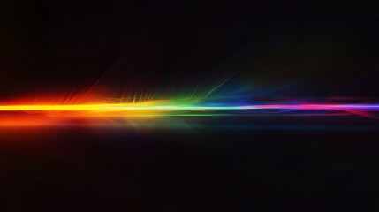 Rainbow prism light creating colorful spectral lines on dark background