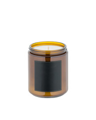 Aroma wax soy candle in brown glass cylindrical jar. Isolate on white background. Amber minimalist candle packaging design with copy space. Aromatherapy, craft home decor, gift idea, relaxation