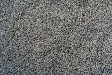 Small stone texture, white stone wall for background, pebbles for garden decoration