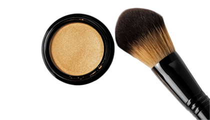 A golden powder compact with a makeup brush, ideal for cosmetic application.
