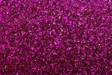 Explore the enchanting interplay of light and texture in this abstract pink glitter backdrop.