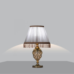  A stylish table lamp with a transparent fabric shade and a crystal base, offering soft and elegant lighting. Perfect for adding a luxurious touch to any modern home or office space.
