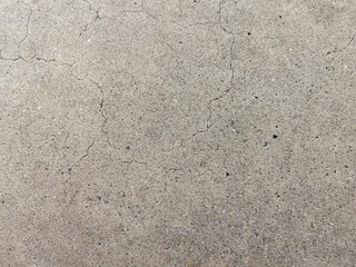 Textured Concrete Surface with Cracks