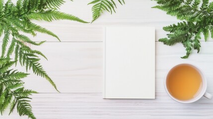 Serene Cozy Atmosphere - Empty Book Mockup on Wooden Table with Green Ferns and Tea Cup