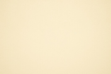 house wall with fine plaster, painted light yellow beige