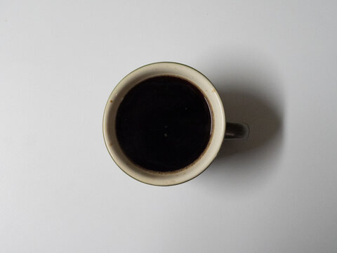 A fresh cup of coffee in an espresso cup