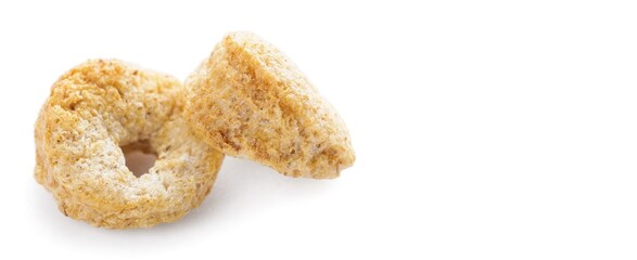 Tasty cereal rings on white background with space for text
