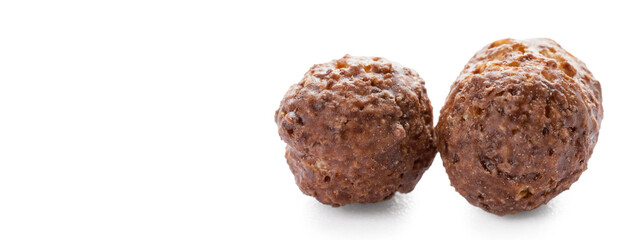 Tasty chocolate corn balls on white background
