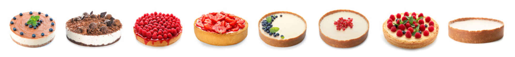 Set of delicious cheesecakes on white background