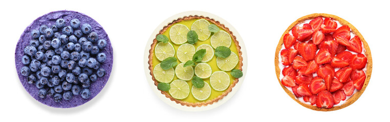 Set of delicious cheesecakes on white background, top view