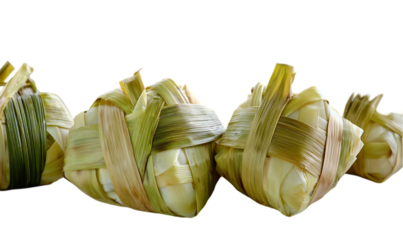 Traditional rice dumplings wrapped in leaves, often enjoyed during festivals.