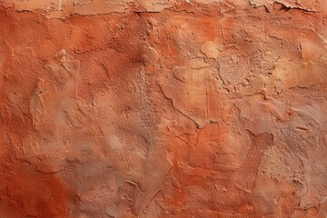 Photo of Old ancient orange plaster wall. Background texture for backdrops or mapping