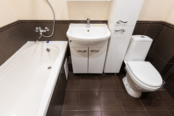modern bathroom room with toilet and washing machine