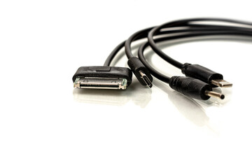 Electronic cable for connecting various devices and equipment close-up on a white background, copy space, inscription space