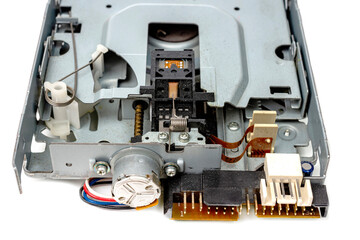 An electronic board with radio components, connectors, slots and a processor chip from an electronic CD reader,