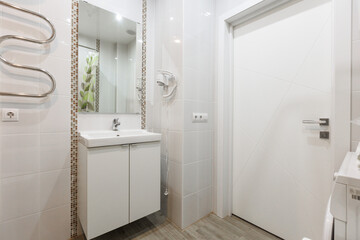 modern bathroom room with toilet and washing machine